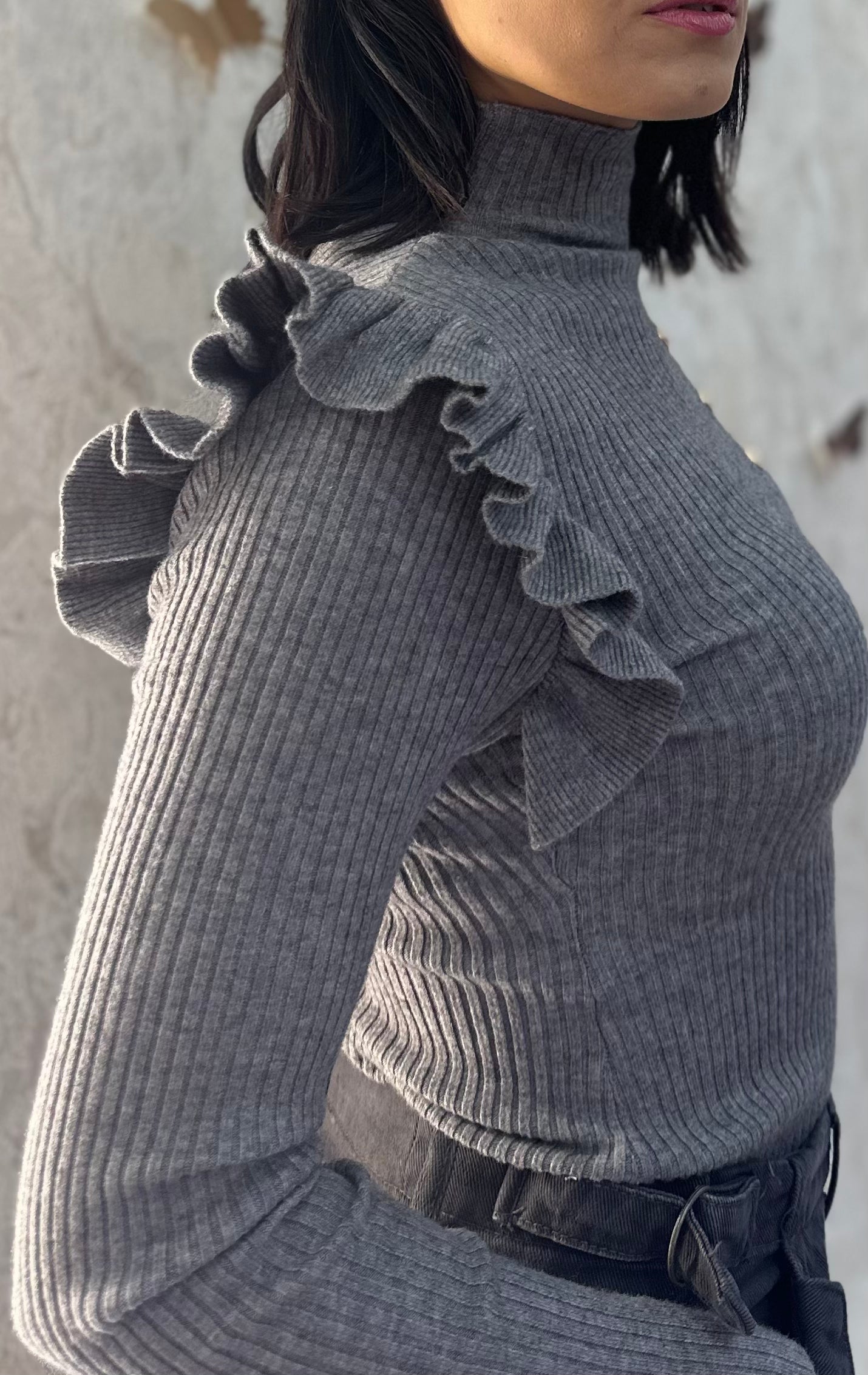 Maglione con bottoni